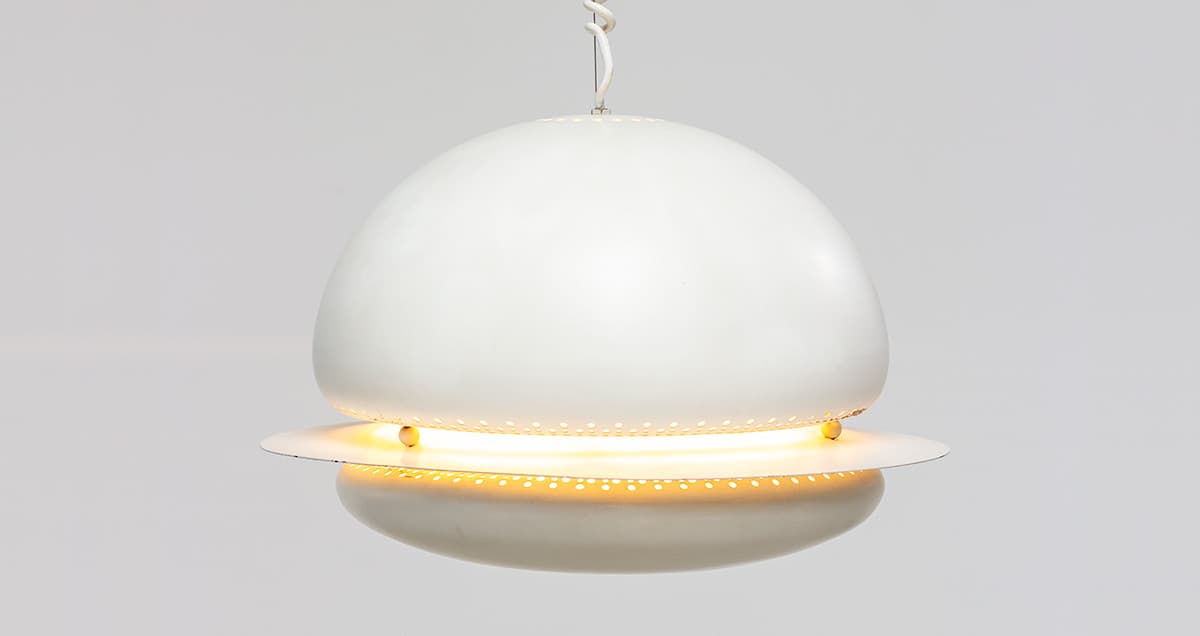 A rare and elegant piece of Italian mid century design, the Nictea ceiling lamp was designed by Tobia Scarpa in 1961. Celebrated for its sculptural, space age form and refined materiality, this early edition exemplifies Scarpa’s unique ability to blend technical innovation with architectural beauty.