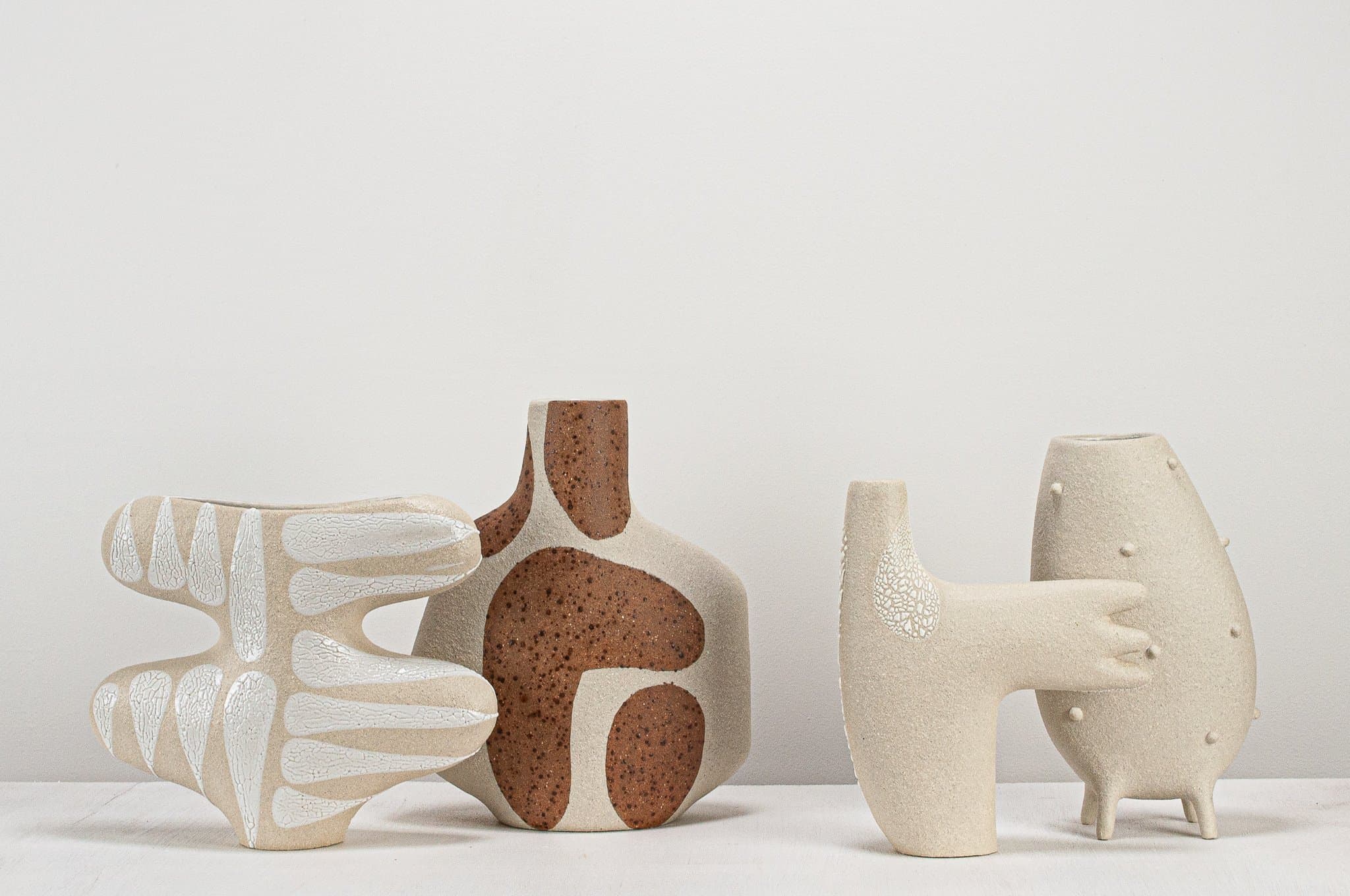 Sitting Harmoniously – Groups of Ceramic Sculptures Handcrafted by Clay Canoe