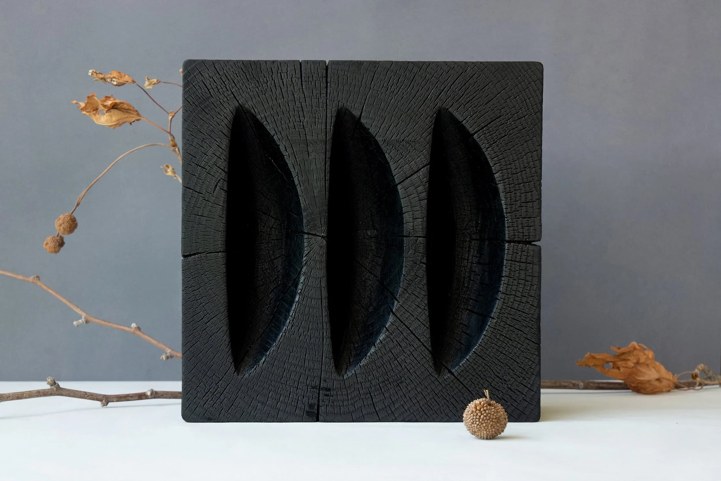 The Shou Sugi Ban Collection is a collection of nine sculptural wooden bowls, inspired by a project by the sculptor Isamu Noguchi, “The Sculptor and the Ashtray”. The bowls are hand-carved by a craftsman from Lebanese cedar — a fragrant wood that w