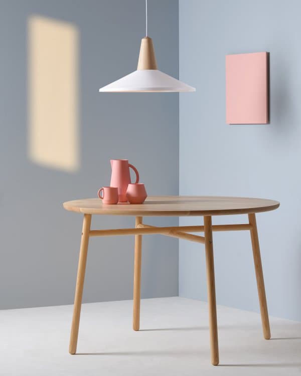 Round Fafa table by Schneid, styled with an Eikon Shell lamp and Unison ceramics.