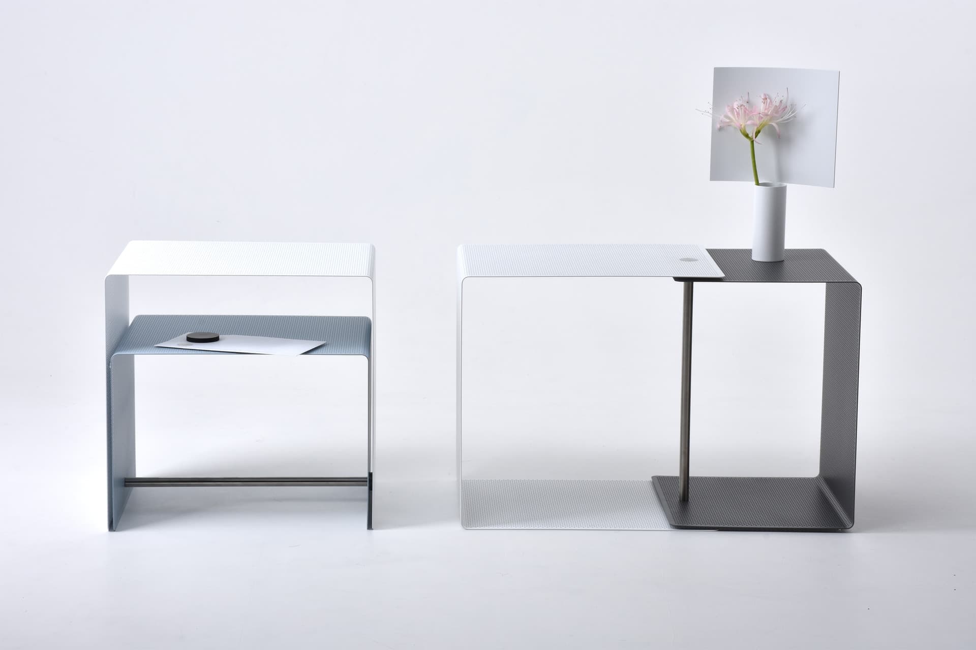 Layer side table by Shinya Oguchi, with its rotating inner layer shown closed and open.