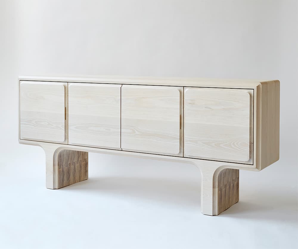 Cove / Arc Credenza by Kai-wei Hsu, in ash, shown in three-quarter view