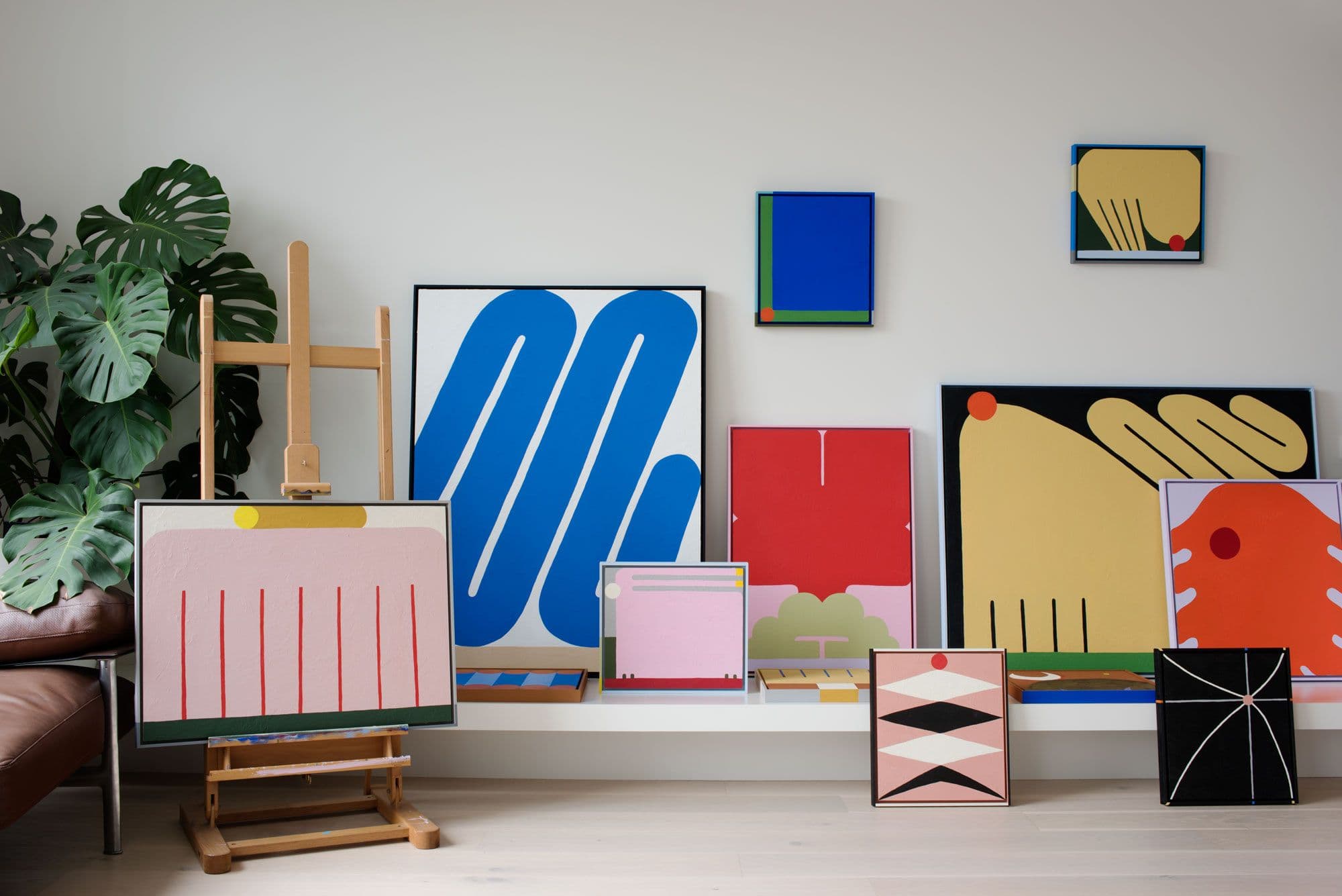 A group of Evi O’s Jungle paintings, including the blue looping composition retained in the original article