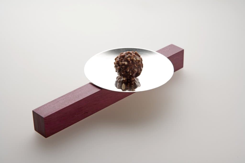 Jacqueline Scholes: silver dish on a wooden support; replacement view corresponding to the article’s silver-and-rosewood-support caption.