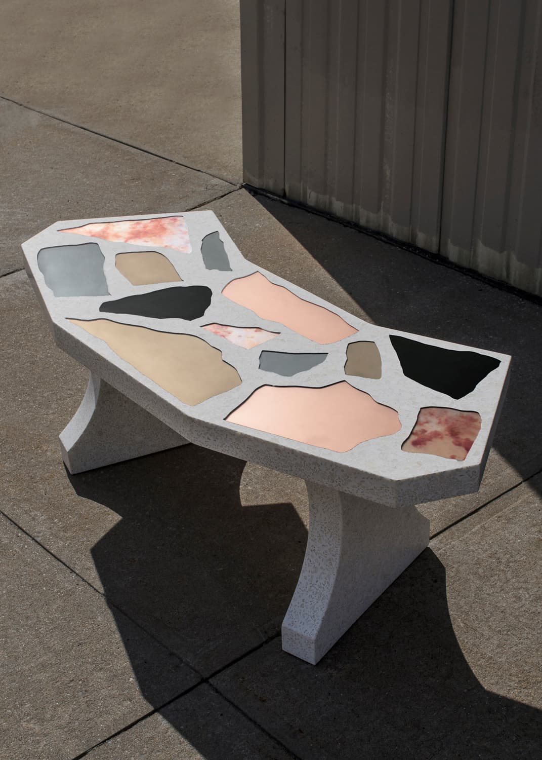 Mirazzo — curved mirrored-terrazzo bench outdoors
