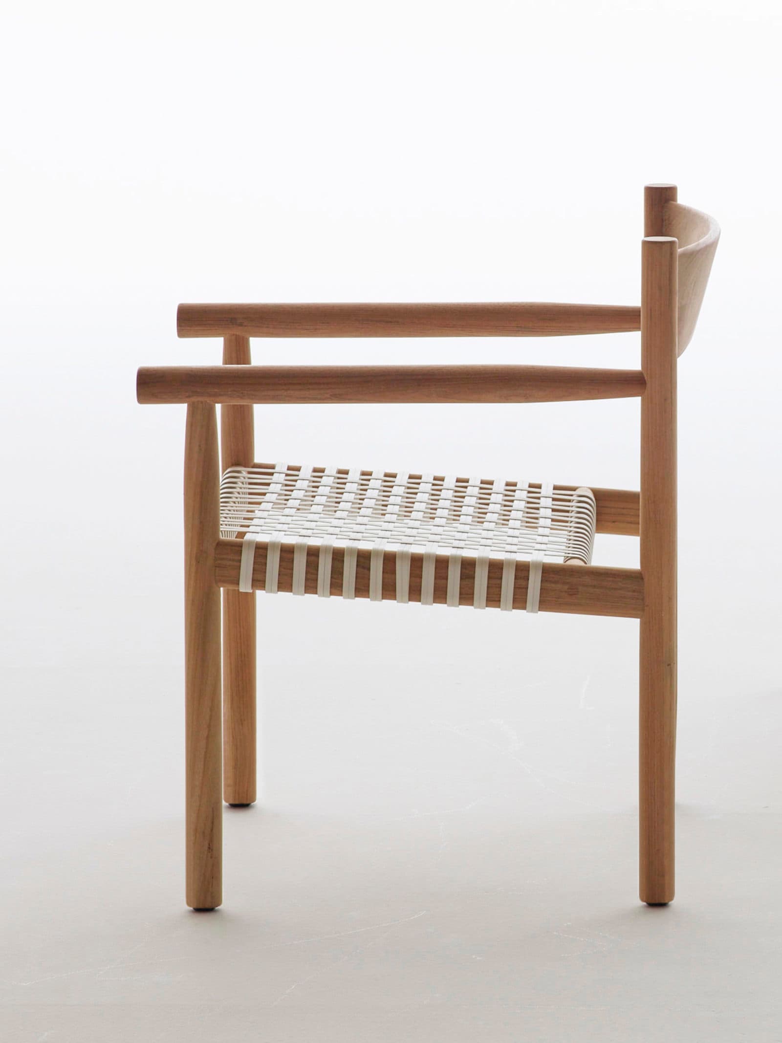 Tibbo dining chair seen without cushion, teak, woven fibre, textiles, Dedon, 2016 / © Dedon