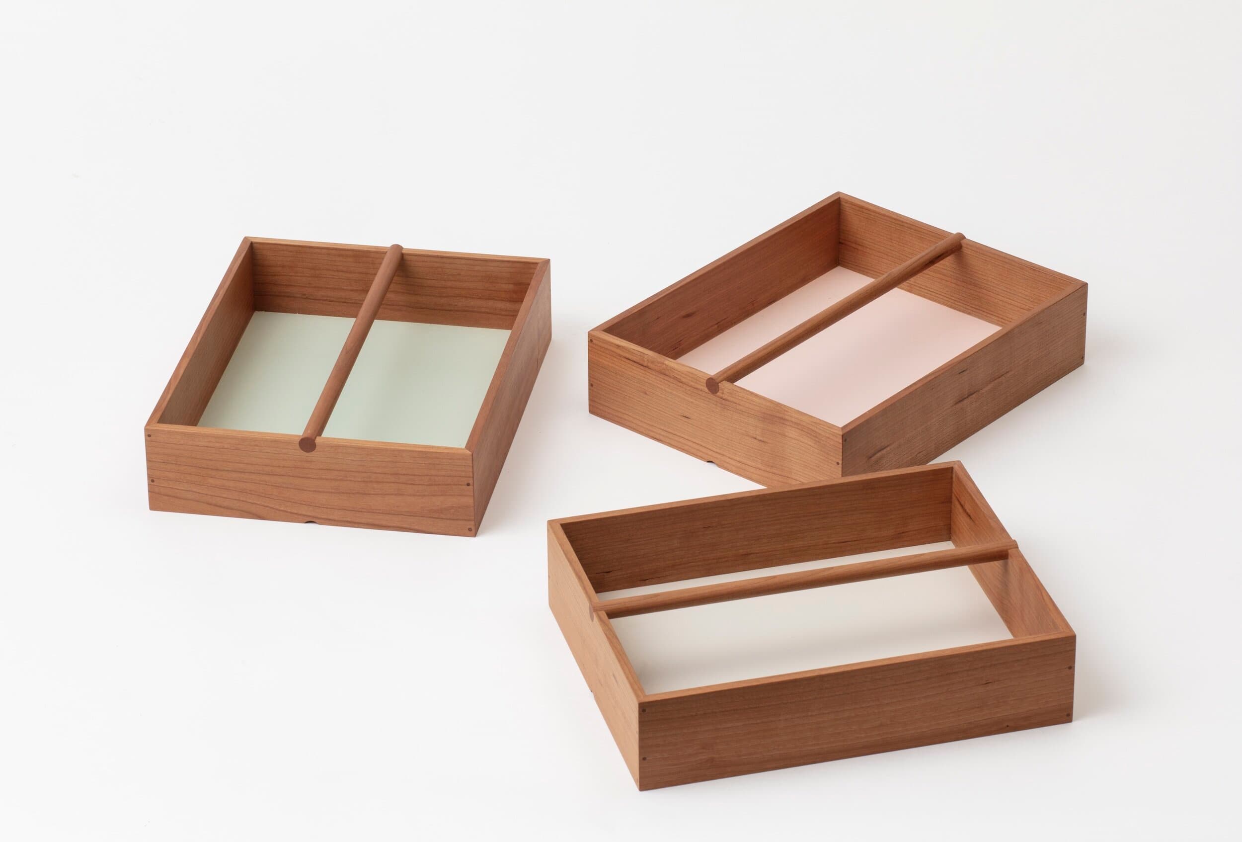 Three Paper Hotel boxes by Akiko Ken Made with green, pink and pale linoleum bottoms
