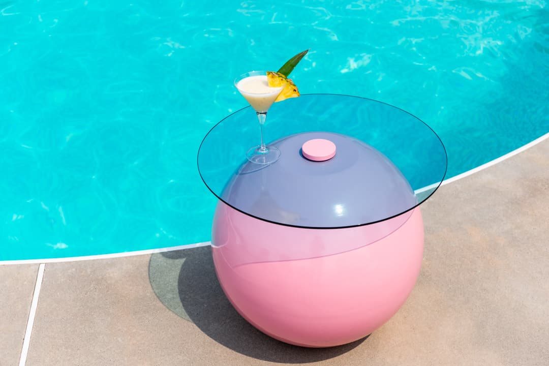 Pluto Table by Ben Barber, poolside