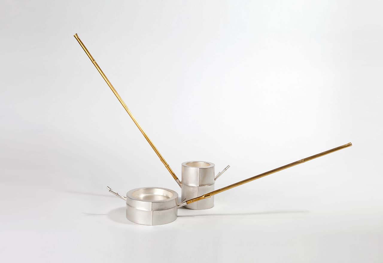 Chien-Wei Chang’s Bamboo Watering Cans (2010), with long gold-plated spouts
