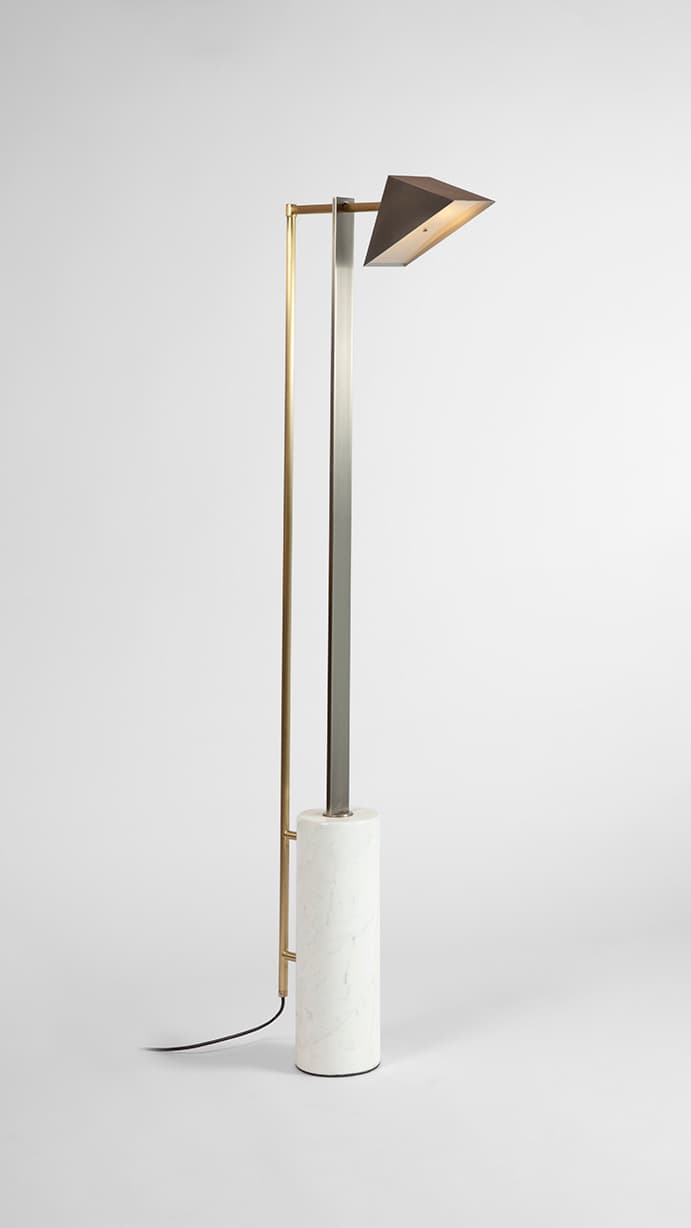 Marble and Wedge floor lamp by Square In Circle, with a triangular shade above a white marble base