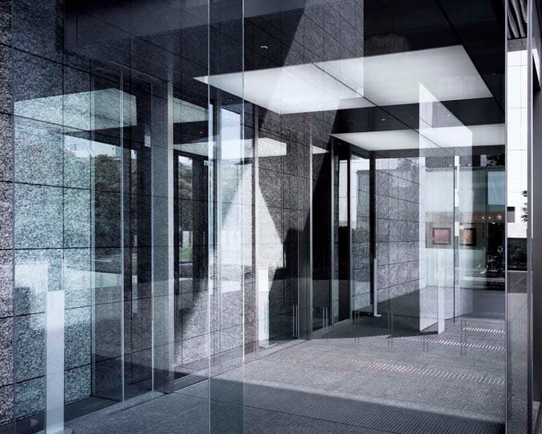 Reflections-in mirroring lights, 2009: layered reflections in a glass-fronted interior