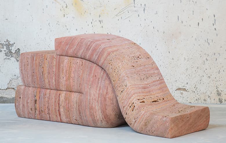 Seduction, Pair 06 in red travertine, photographed in the studio