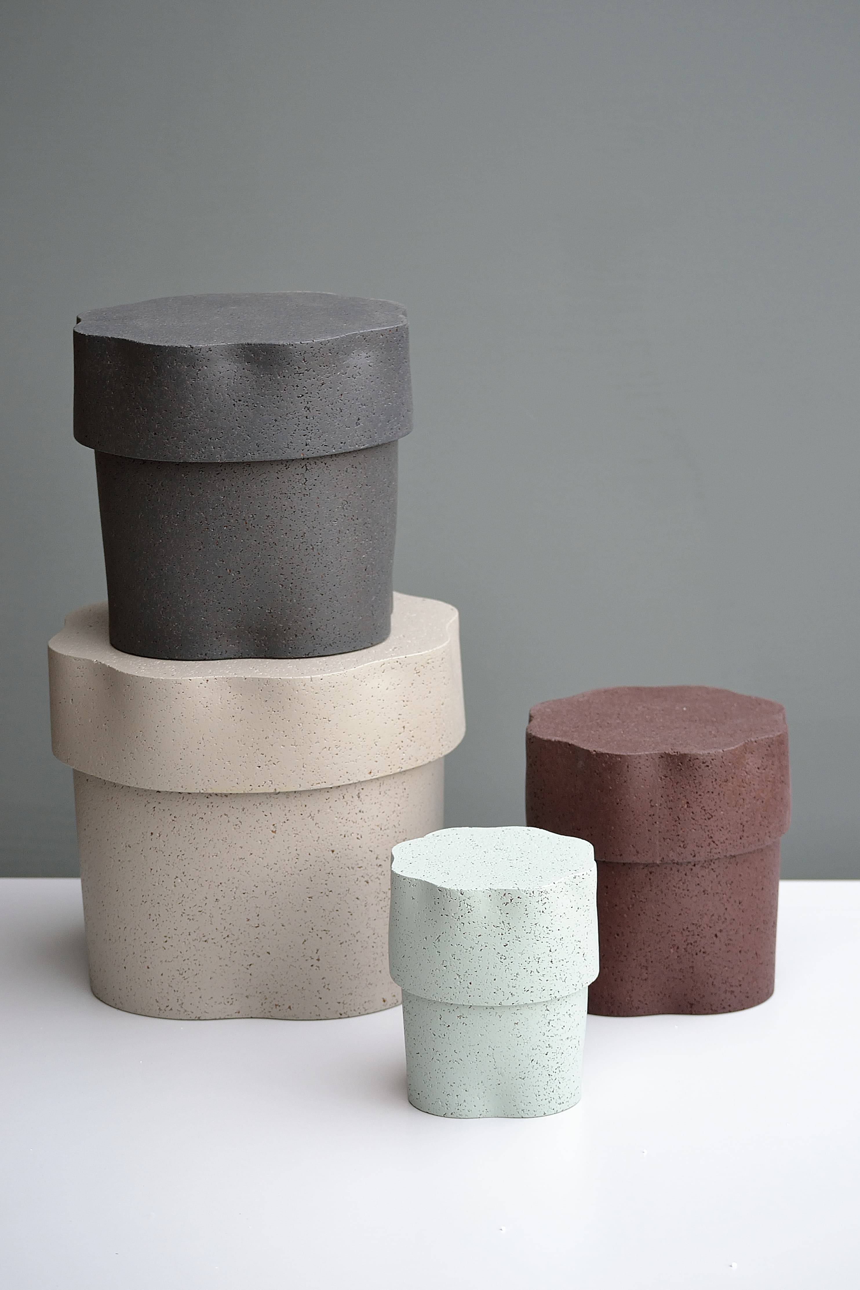 Jig laminated-cork containers, four sizes with organically curved outlines