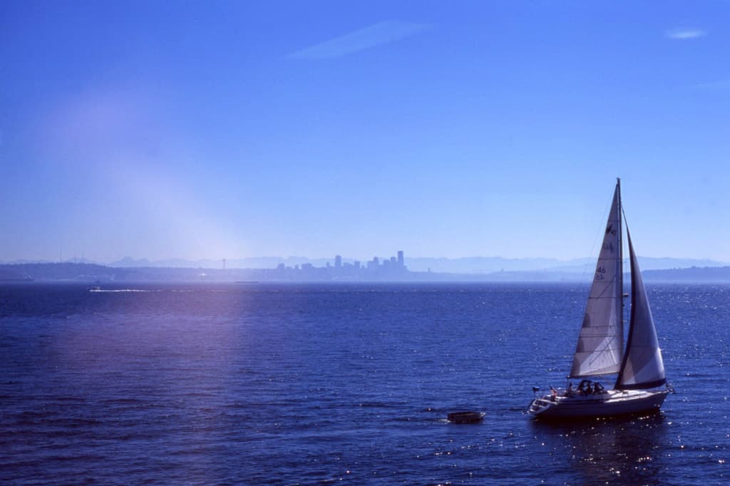 Molly Wizenberg: sailboat from ferry window, summer2010.