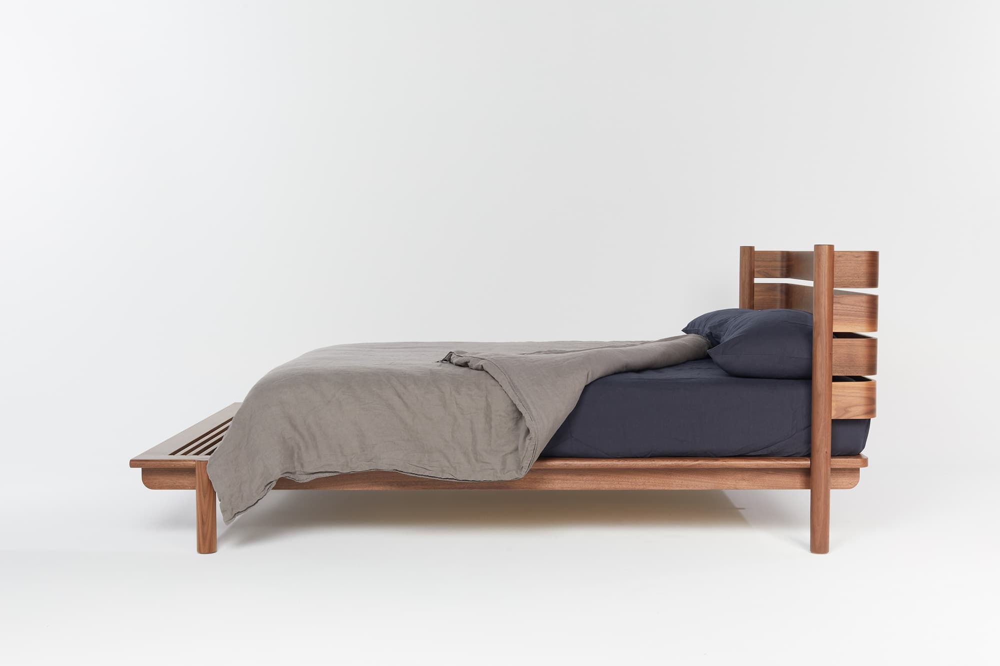 Title Bed 04 in walnut by Mast