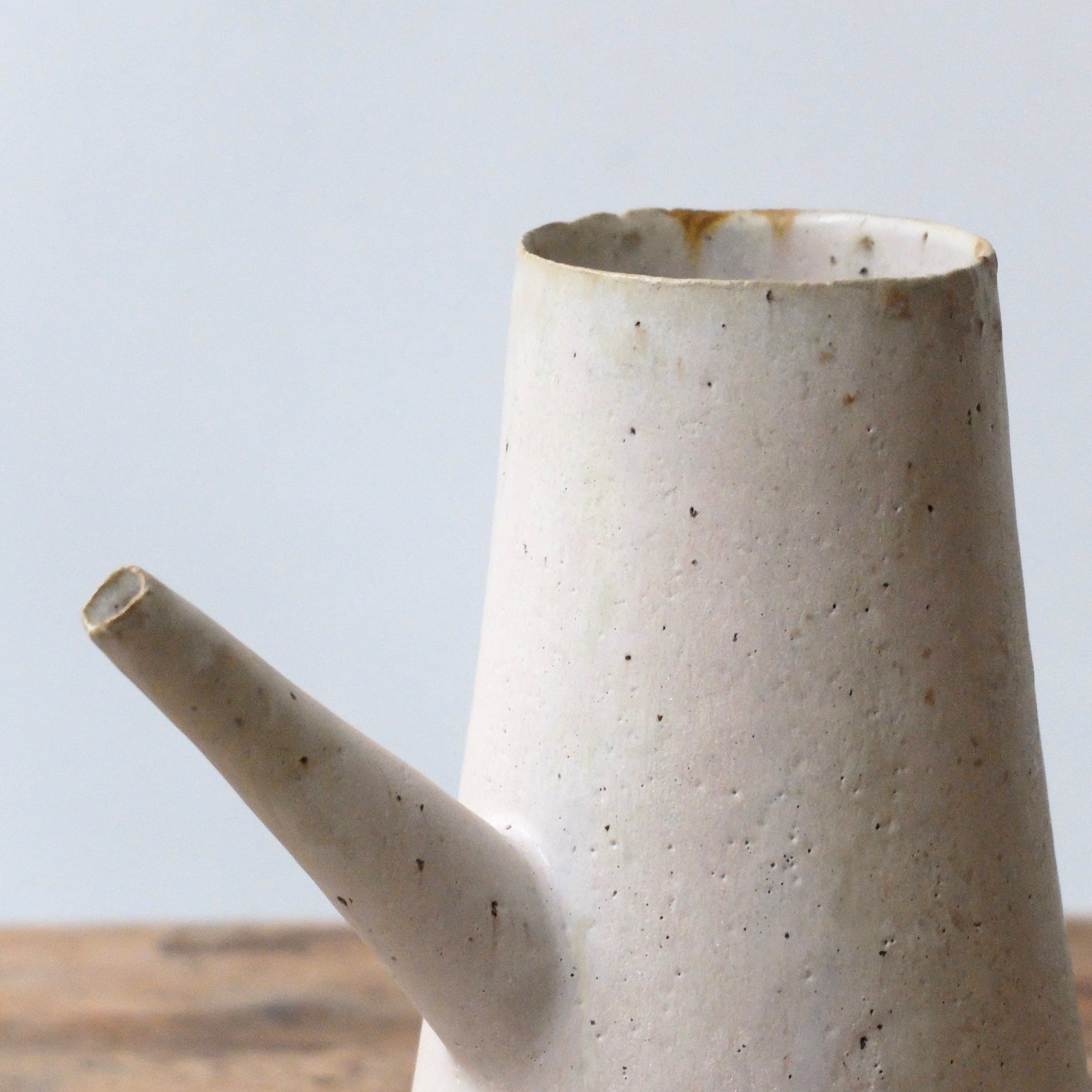 Yoko Ozawa’s white Kirikabu stump pouring vessel, glaze and spout detail.
