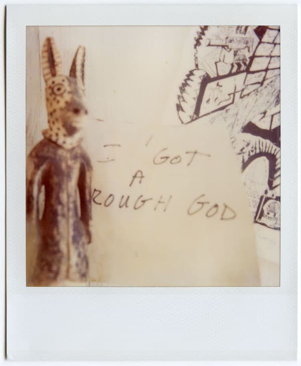 Shoot the Moon: animal figurine against a marked wall, 1999–2009 selection
