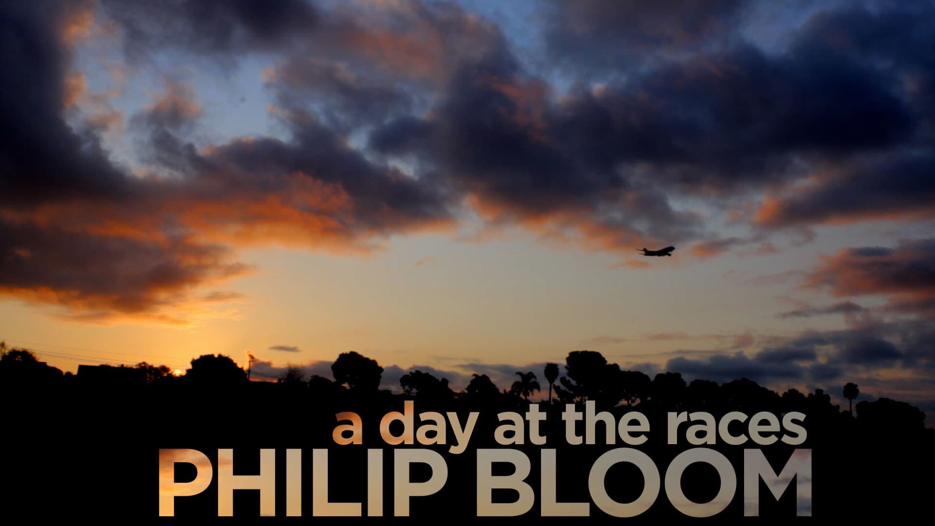 A Day at the Races: original film title frame over the Hollywood-stables dawn sky