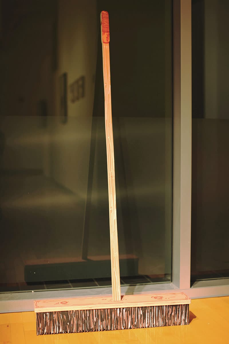Pushbroom (2008), a screen-printed wood sculpture by Luke O’Sullivan.