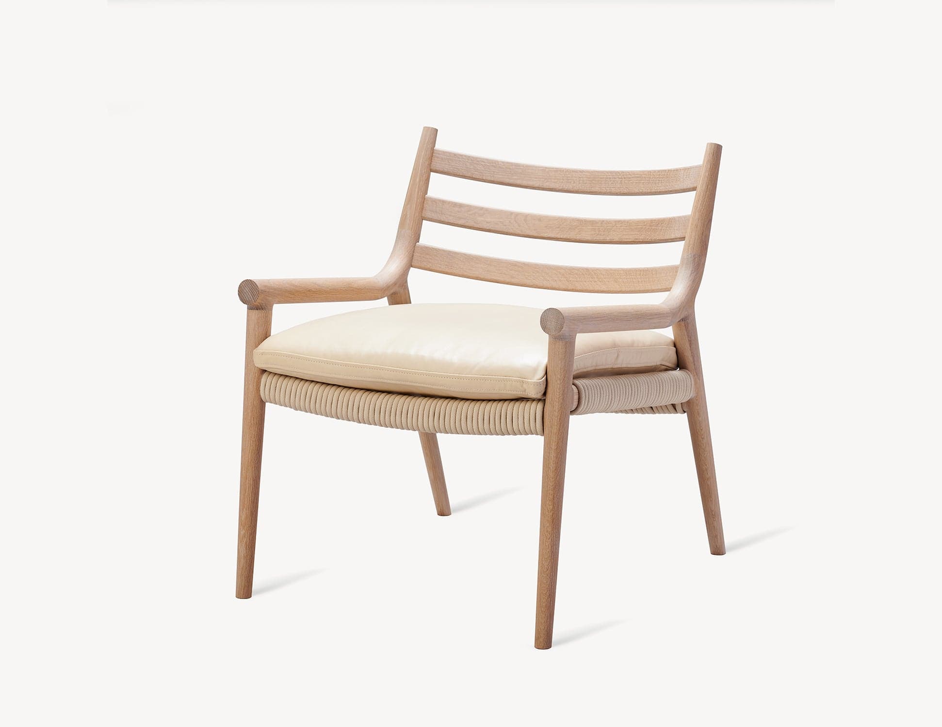 Coolican & Company Parkside Lounge in white oak with blonde leather, showing its woven seat.