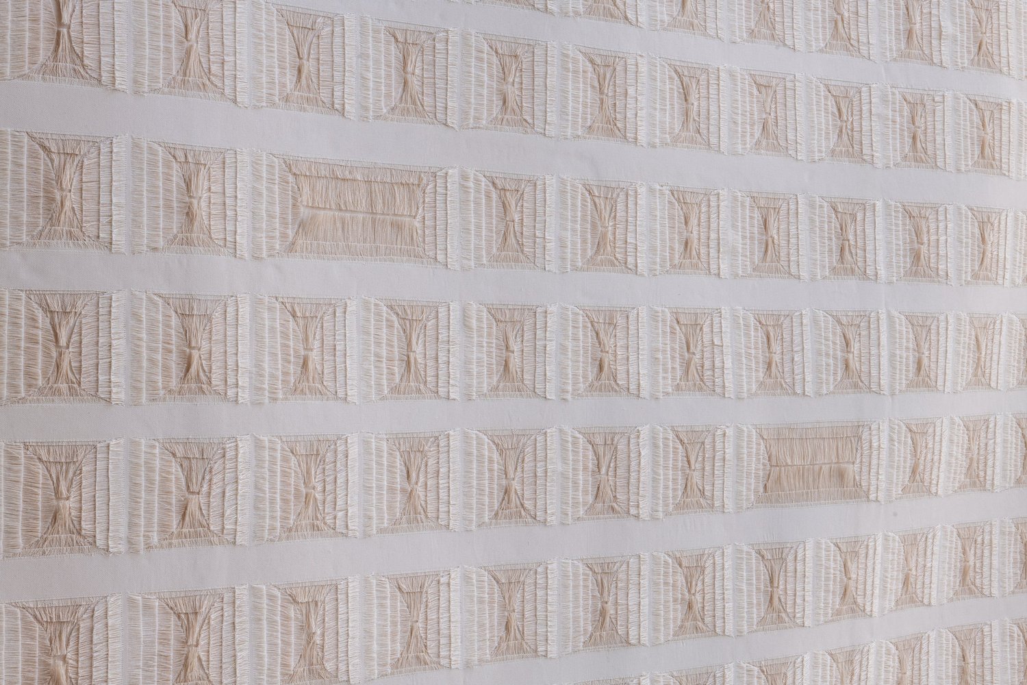 Close view of fibres within the small repeated squares.