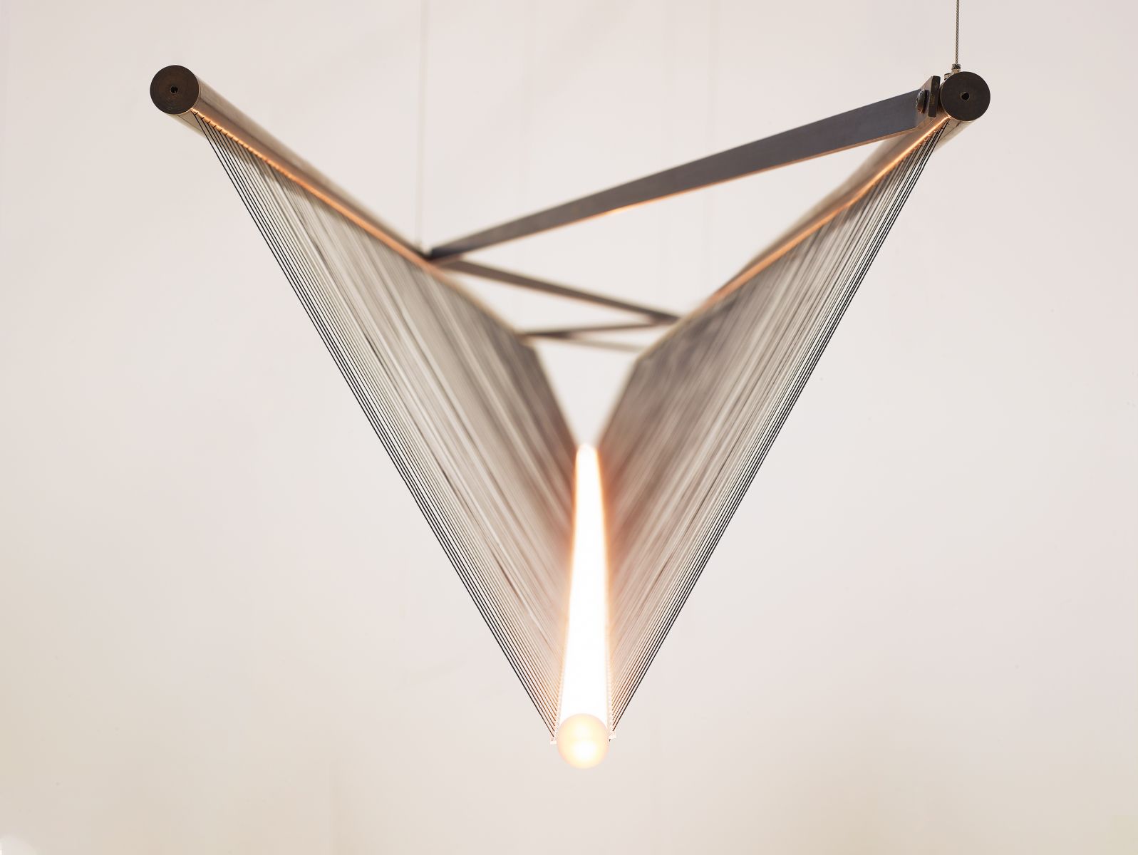 Spun Beam by Umut Yamac. Patinated brass, thread, stainless steel 2